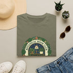 Botanical book club shirt, plant lady book lover tee, cottagecore bookshelf graphic, cat and plants t-shirt, sand colored bookish apparel